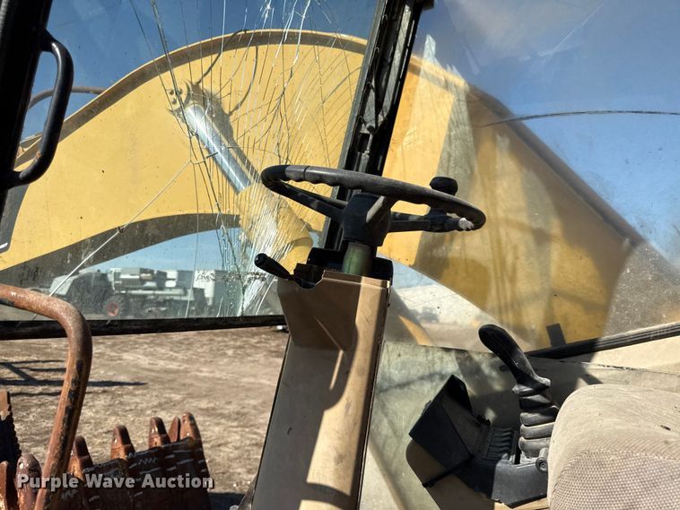 image for item EC4461 2002 Caterpillar M315 wheeled excavator