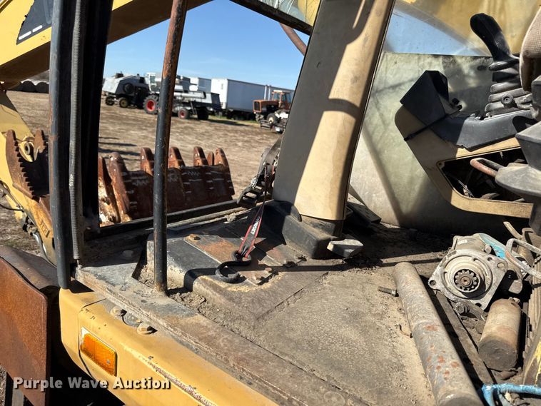 image for item EC4461 2002 Caterpillar M315 wheeled excavator