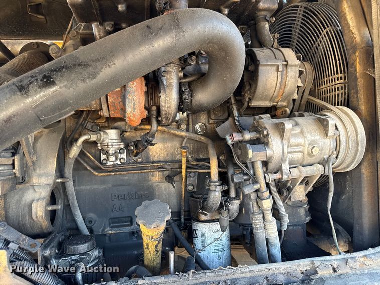 image for item EC4461 2002 Caterpillar M315 wheeled excavator