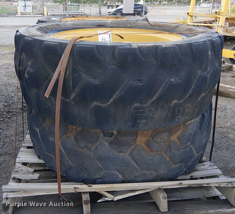 image for item EE4978 (4) 400/75-28 tires and wheels