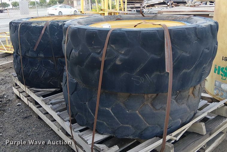 image for item EE4978 (4) 400/75-28 tires and wheels