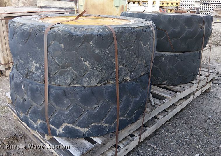 image for item EE4978 (4) 400/75-28 tires and wheels