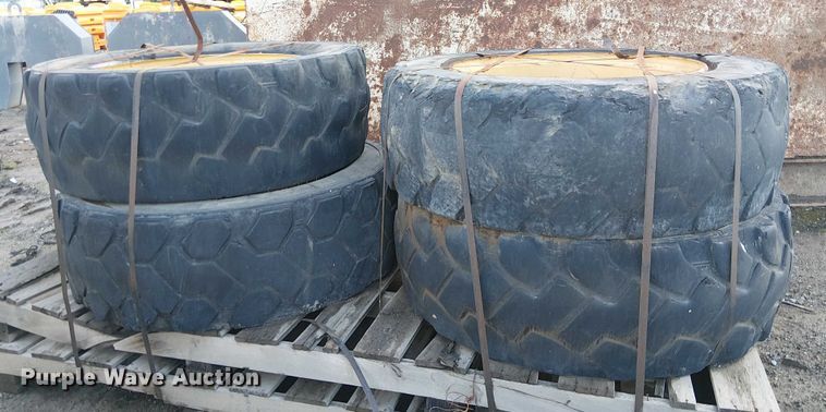 image for item EE4978 (4) 400/75-28 tires and wheels