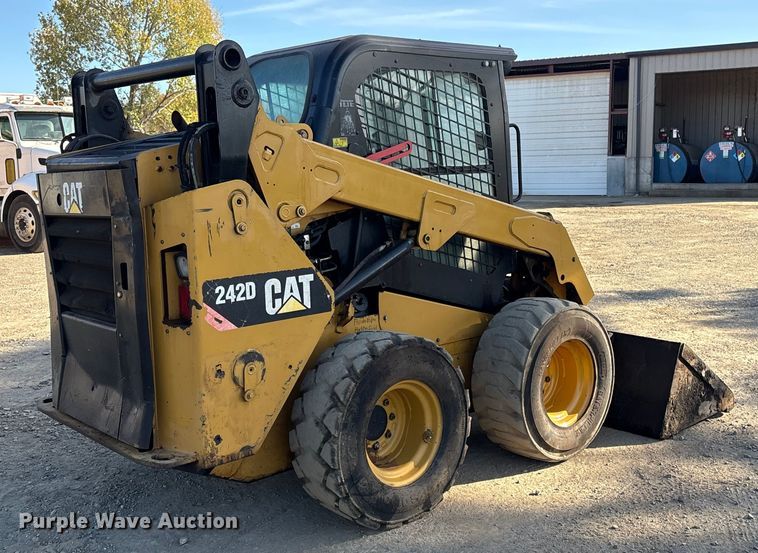 MINI CARGADOR SOBRE RUEDAS 2014 CATERPILLAR 242D
