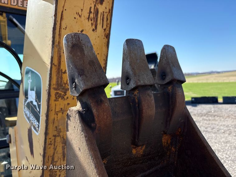 image for item EM6185 1996 John Deere 310D backhoe
