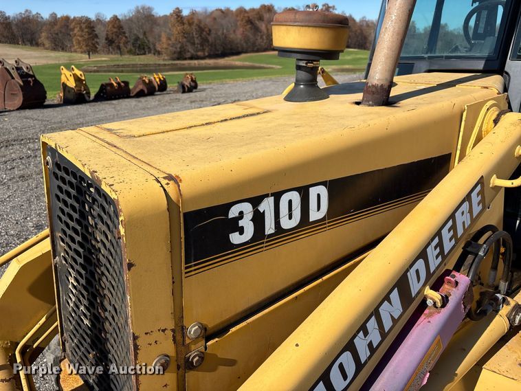 image for item EM6185 1996 John Deere 310D backhoe