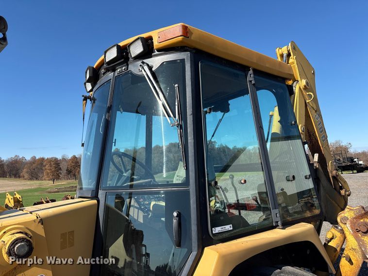 image for item EM6185 1996 John Deere 310D backhoe