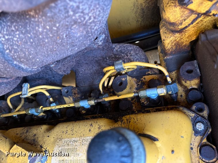 image for item EM6185 1996 John Deere 310D backhoe