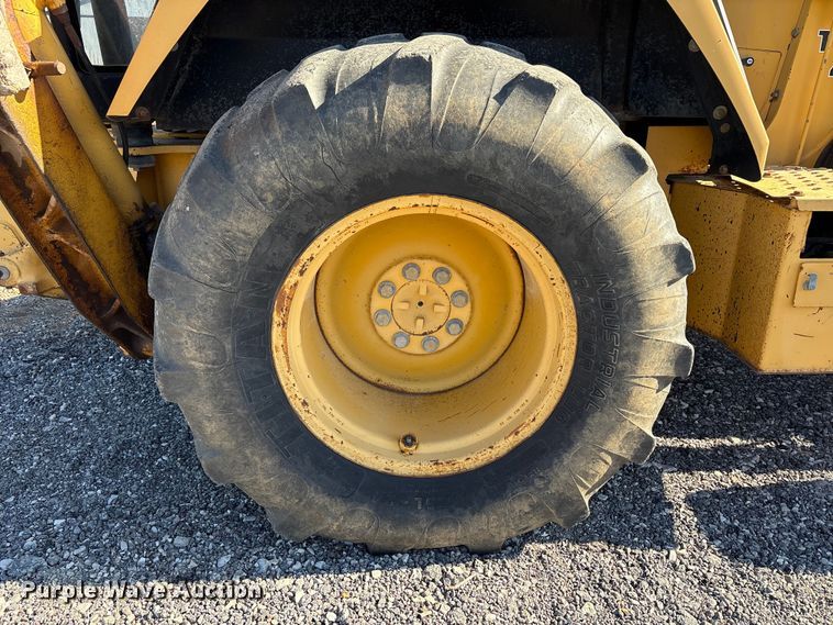 image for item EM6185 1996 John Deere 310D backhoe