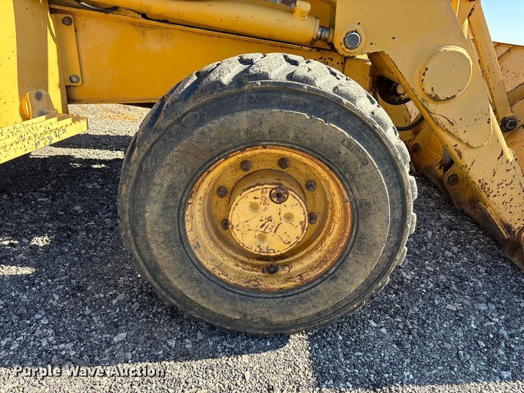 image for item EM6185 1996 John Deere 310D backhoe