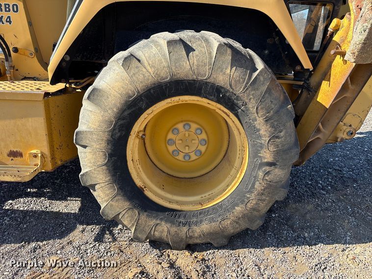 image for item EM6185 1996 John Deere 310D backhoe