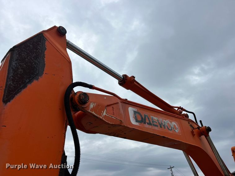 image for item ET6707 1999 Daewoo DH 130W wheeled excavator
