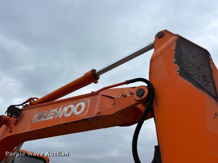 image for item ET6707 1999 Daewoo DH 130W wheeled excavator