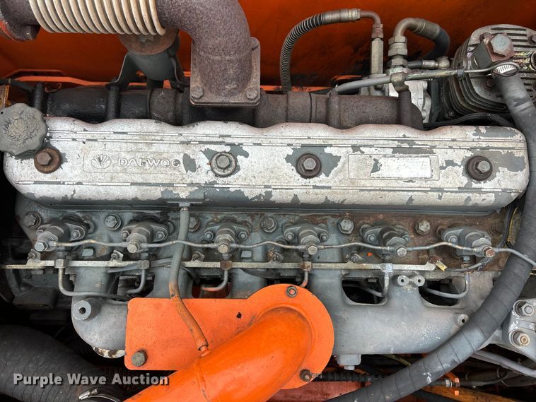 image for item ET6707 1999 Daewoo DH 130W wheeled excavator