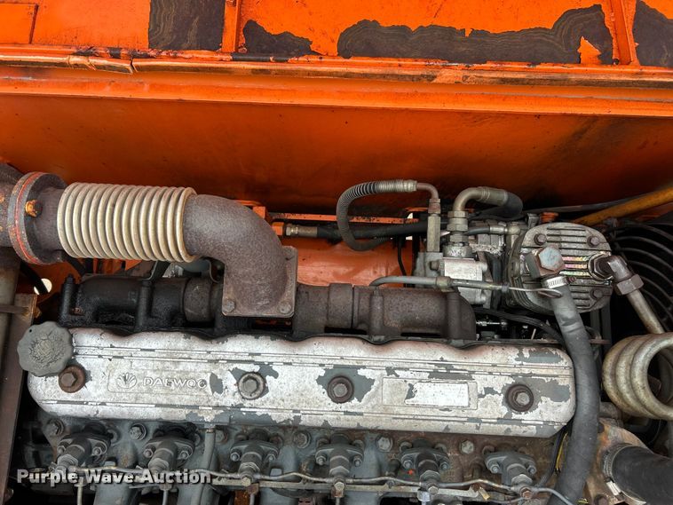image for item ET6707 1999 Daewoo DH 130W wheeled excavator