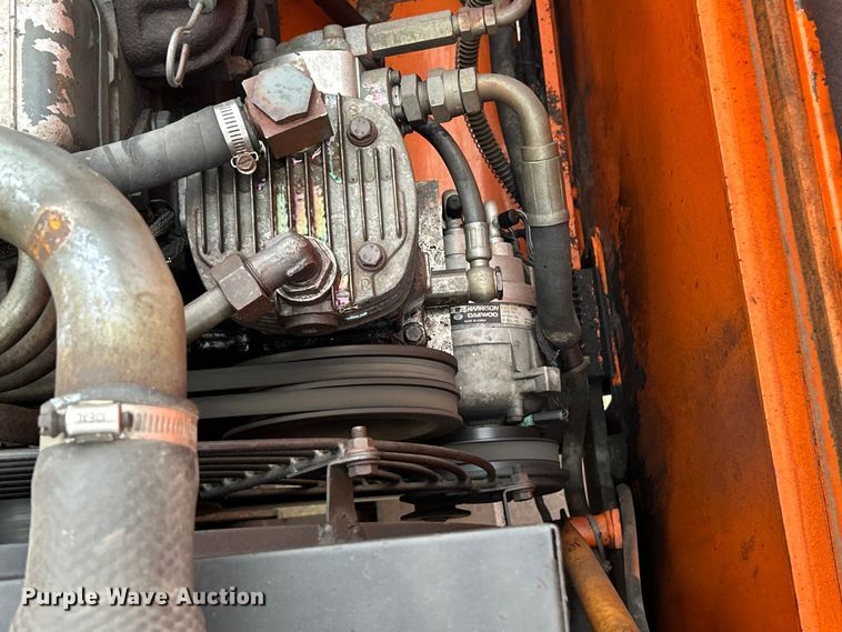 image for item ET6707 1999 Daewoo DH 130W wheeled excavator