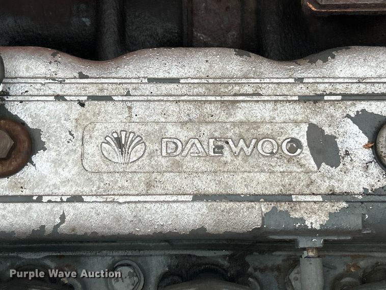 image for item ET6707 1999 Daewoo DH 130W wheeled excavator