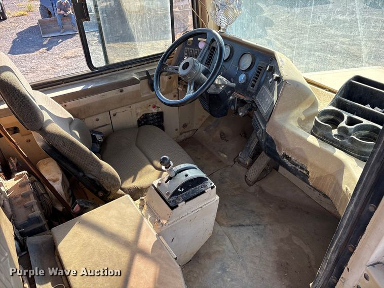 image for item ET7250 1997 Caterpillar D250E articulated haul truck