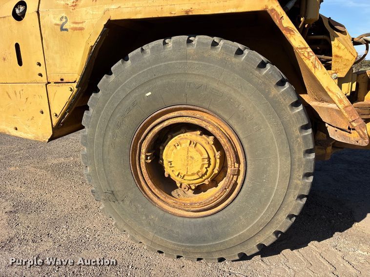 image for item ET7250 1997 Caterpillar D250E articulated haul truck