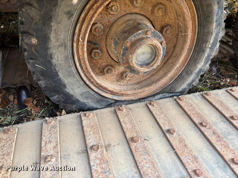 image for item EV3303 Track carrier with digger derrick