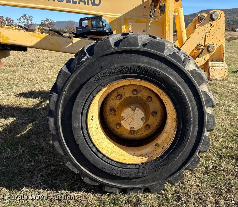 image for item FI0029 2002 New Holland RG80 motor grader