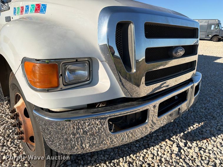 image for item YA1480 2010 Ford F750 Super Duty chipper truck