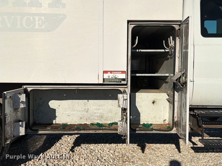 image for item YA1480 2010 Ford F750 Super Duty chipper truck