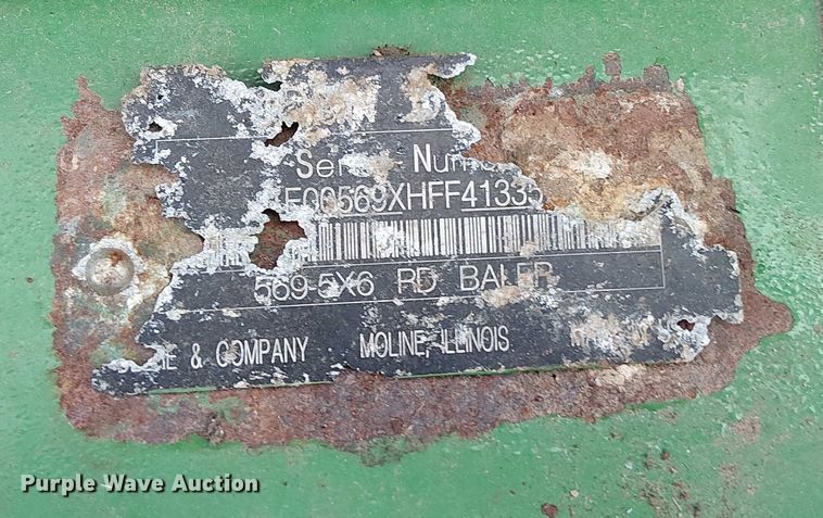 image for item DT4523 2015 John Deere 569 MegaWide Plus round baler
