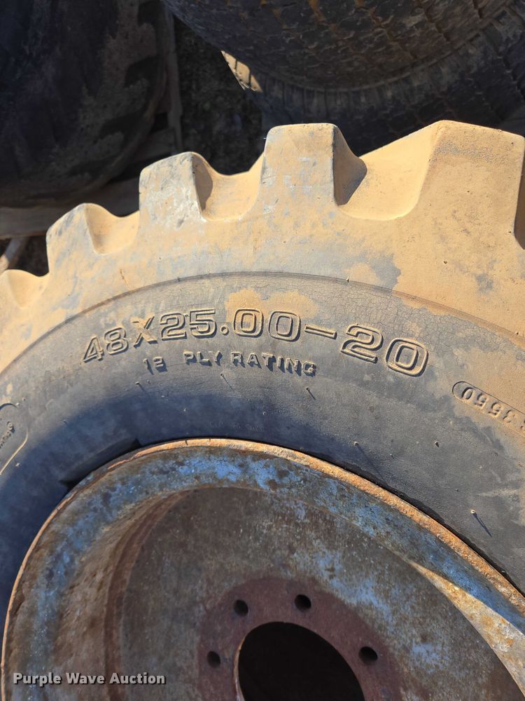 image for item DT4732 Approximately 20 tires and wheels