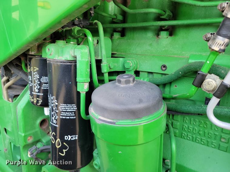 image for item EA2586 2003 John Deere  8320 MFWD tractor