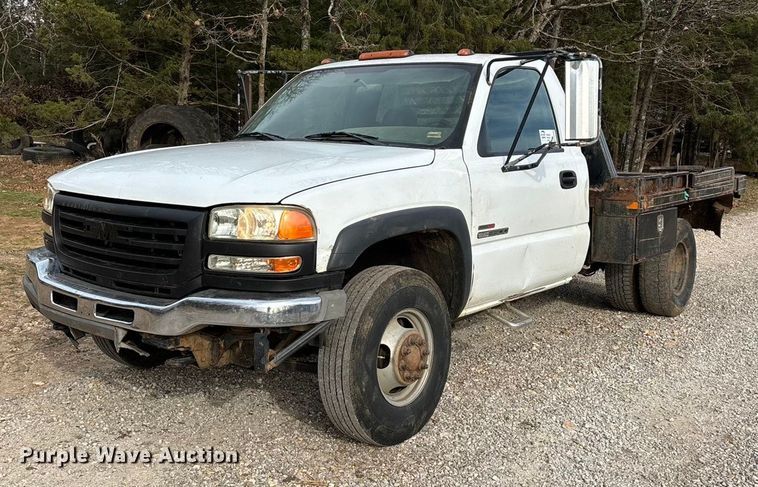 image for item ED2443 2005 GMC Sierra 3500 bale bed pickup truck