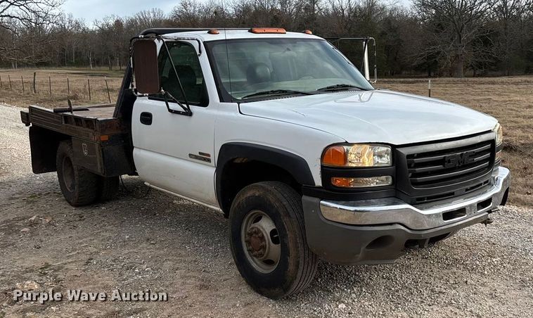 image for item ED2443 2005 GMC Sierra 3500 bale bed pickup truck