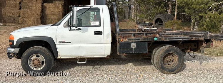 image for item ED2443 2005 GMC Sierra 3500 bale bed pickup truck