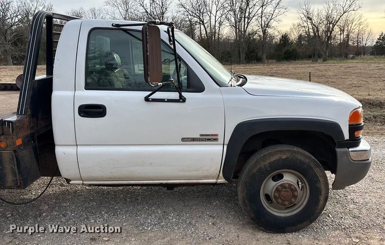 image for item ED2443 2005 GMC Sierra 3500 bale bed pickup truck