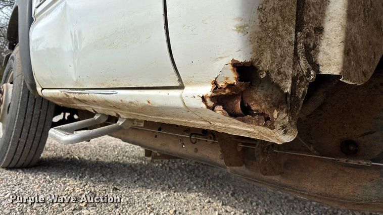 image for item ED2443 2005 GMC Sierra 3500 bale bed pickup truck