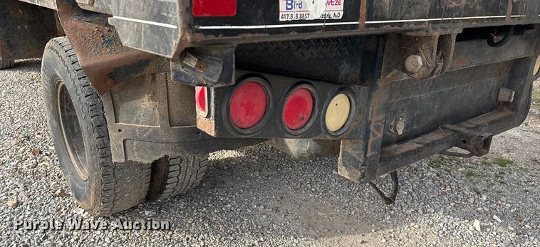 image for item ED2443 2005 GMC Sierra 3500 bale bed pickup truck