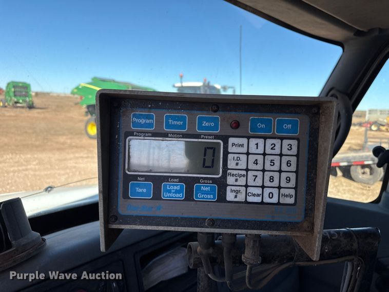 image for item EF6143 2007 International 4300 feed mixer truck