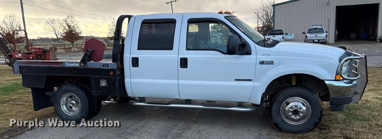 image for item EN0105 2002 Ford F350 Crew Cab bale bed pickup truck