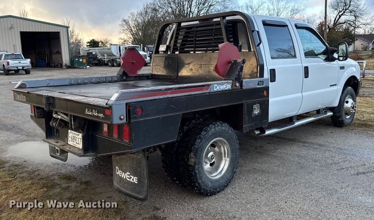 image for item EN0105 2002 Ford F350 Crew Cab bale bed pickup truck