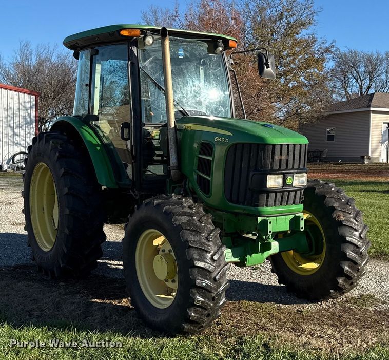image for item EN0111 John Deere 6410D MFWD tractor