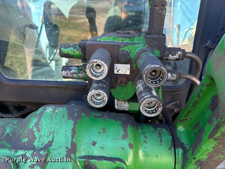 image for item EN0111 John Deere 6410D MFWD tractor