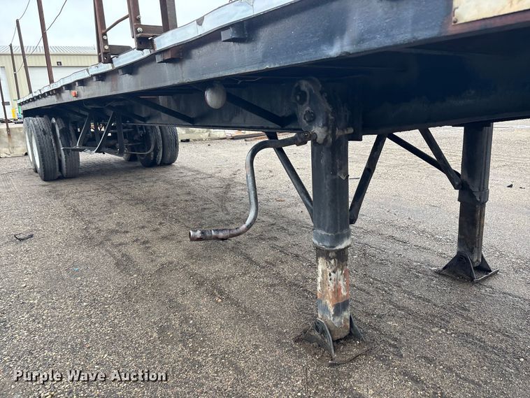 image for item DK0044 2003 AMC Holland flatbed trailer