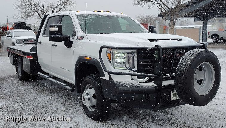 image for item DT0792 2022 GMC Sierra 3500HD Crew Cab flatbed pickup truck