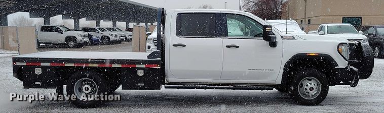 image for item DT0792 2022 GMC Sierra 3500HD Crew Cab flatbed pickup truck