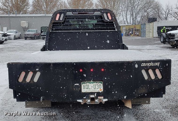 image for item DT0792 2022 GMC Sierra 3500HD Crew Cab flatbed pickup truck