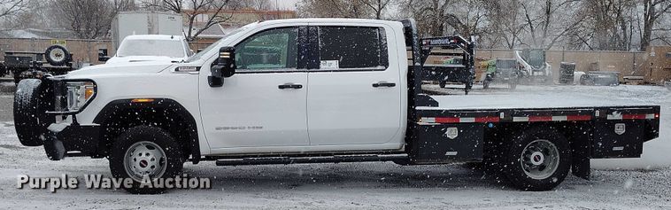image for item DT0792 2022 GMC Sierra 3500HD Crew Cab flatbed pickup truck