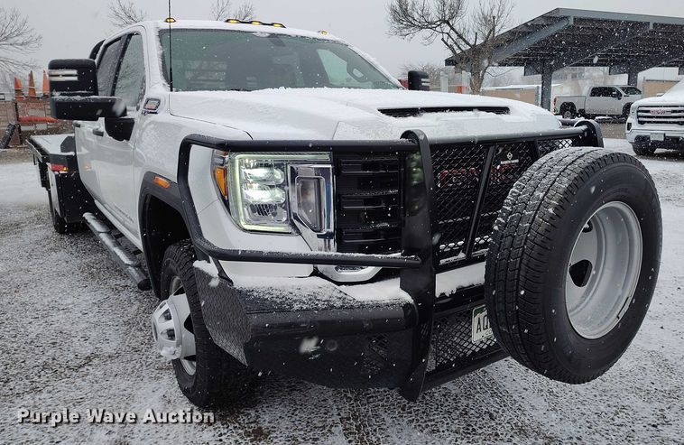 image for item DT0792 2022 GMC Sierra 3500HD Crew Cab flatbed pickup truck