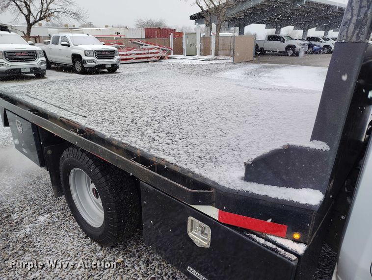 image for item DT0792 2022 GMC Sierra 3500HD Crew Cab flatbed pickup truck