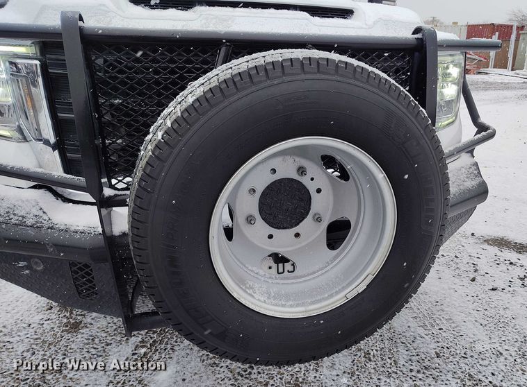 image for item DT0792 2022 GMC Sierra 3500HD Crew Cab flatbed pickup truck