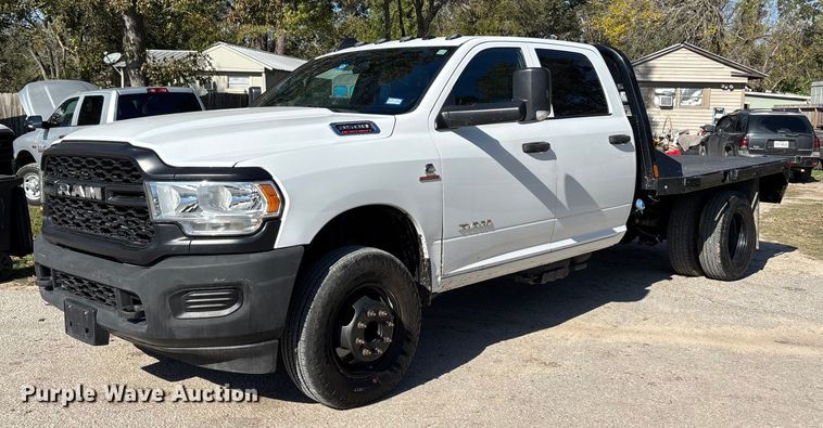 image for item DT4983 2022 RAM 3500HD Crew Cab flatbed pickup truck